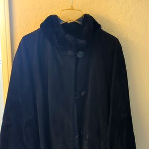 Women's black leather and faux fur coat